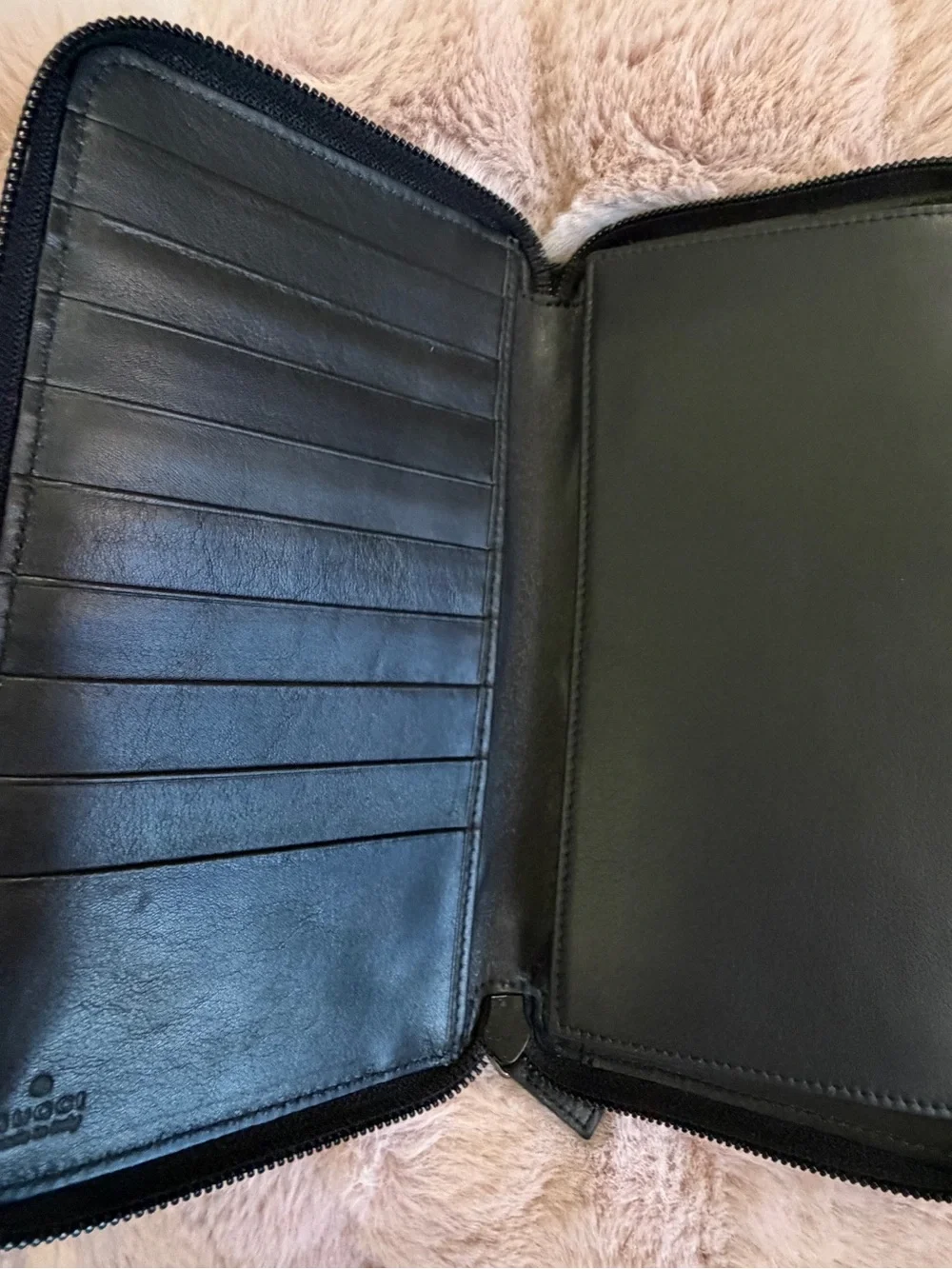 Gucci Black Leather Wallet with Embossed Logo